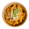 Rigatoni al pesto rosso amb avellanes torrades