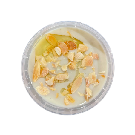 Crema de coliflor braseada y especias indias con almendras tostadas