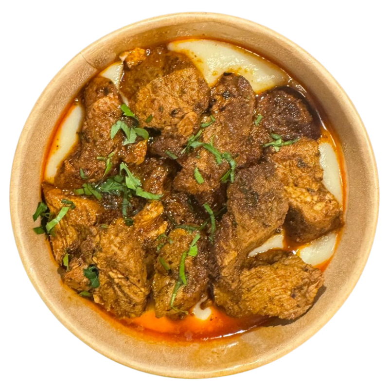 Dados de cerdo moruno con puré de patata y celery