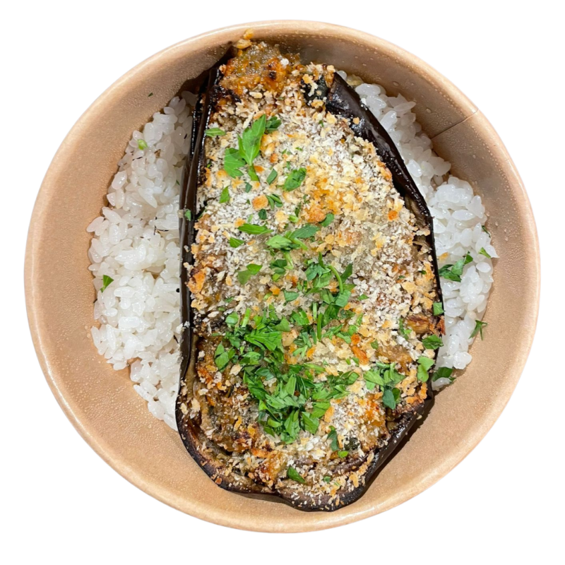 Albergínia farcida de verdures i tofu amb arròs