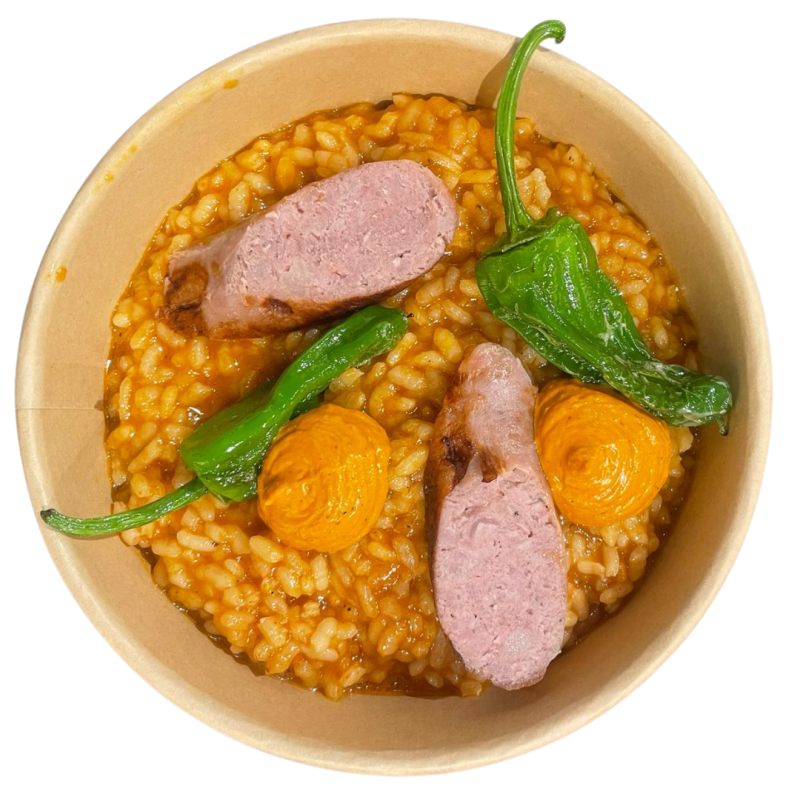 Arròs de botifarra, pebrots del Padró i romesco